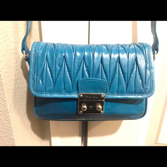 Brand New Cross Body Miu Miu handbag.